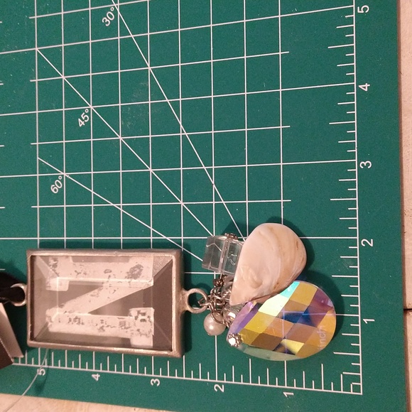 Hanging capital N crystal charm with a black satin tie - Picture 5 of 5